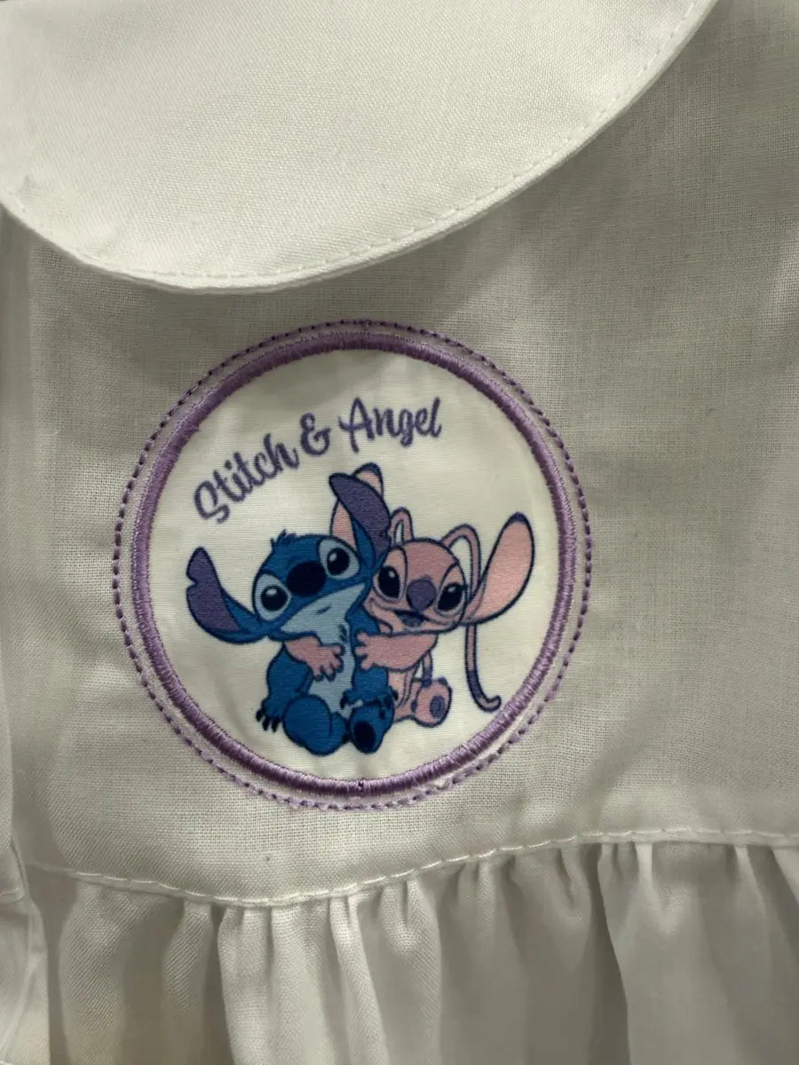 Disney Grembiule asilo bambina bianco con bottoni ricamo stich